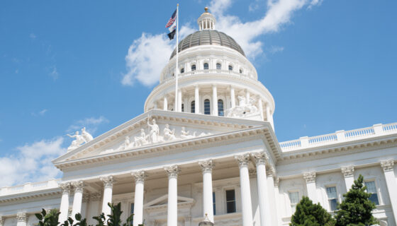 View of dome and front portico of California State Capitol building in Sacramento